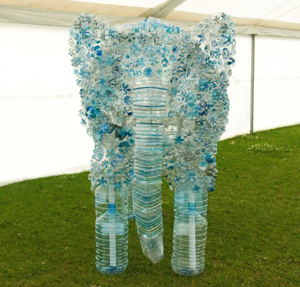 Gardening Create-stunning-sculptures-by-stacking-and-arranging-bottles-in-imaginative-ways.-Its-a-unique-form-of-garden-art-1024x981 20 DIY Bottle Garden Ideas for Green-Thumbed Gardeners